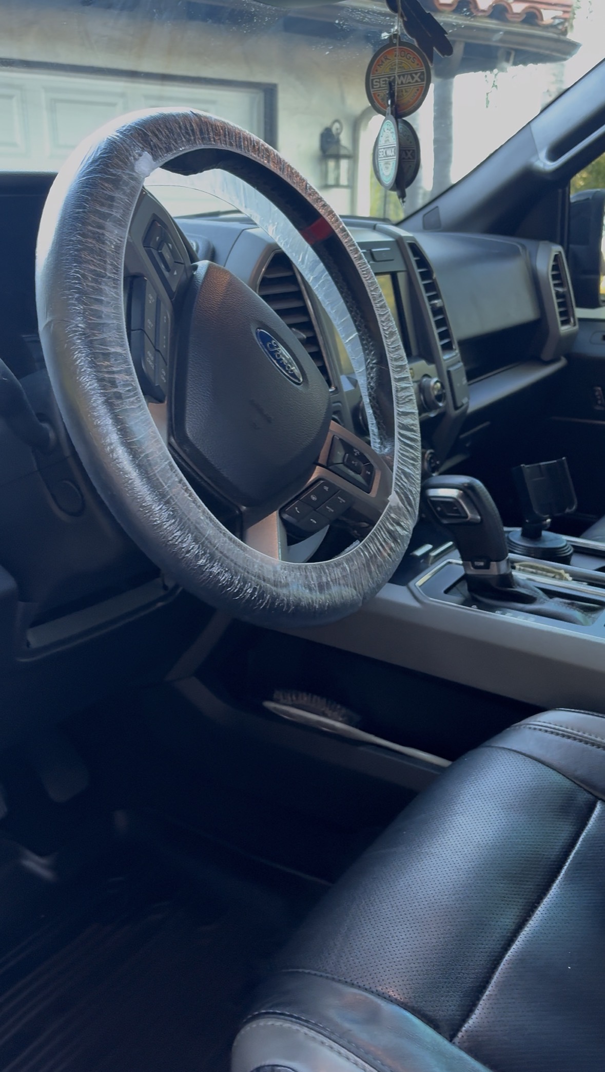 Ford F-150 interior with steering wheel protection