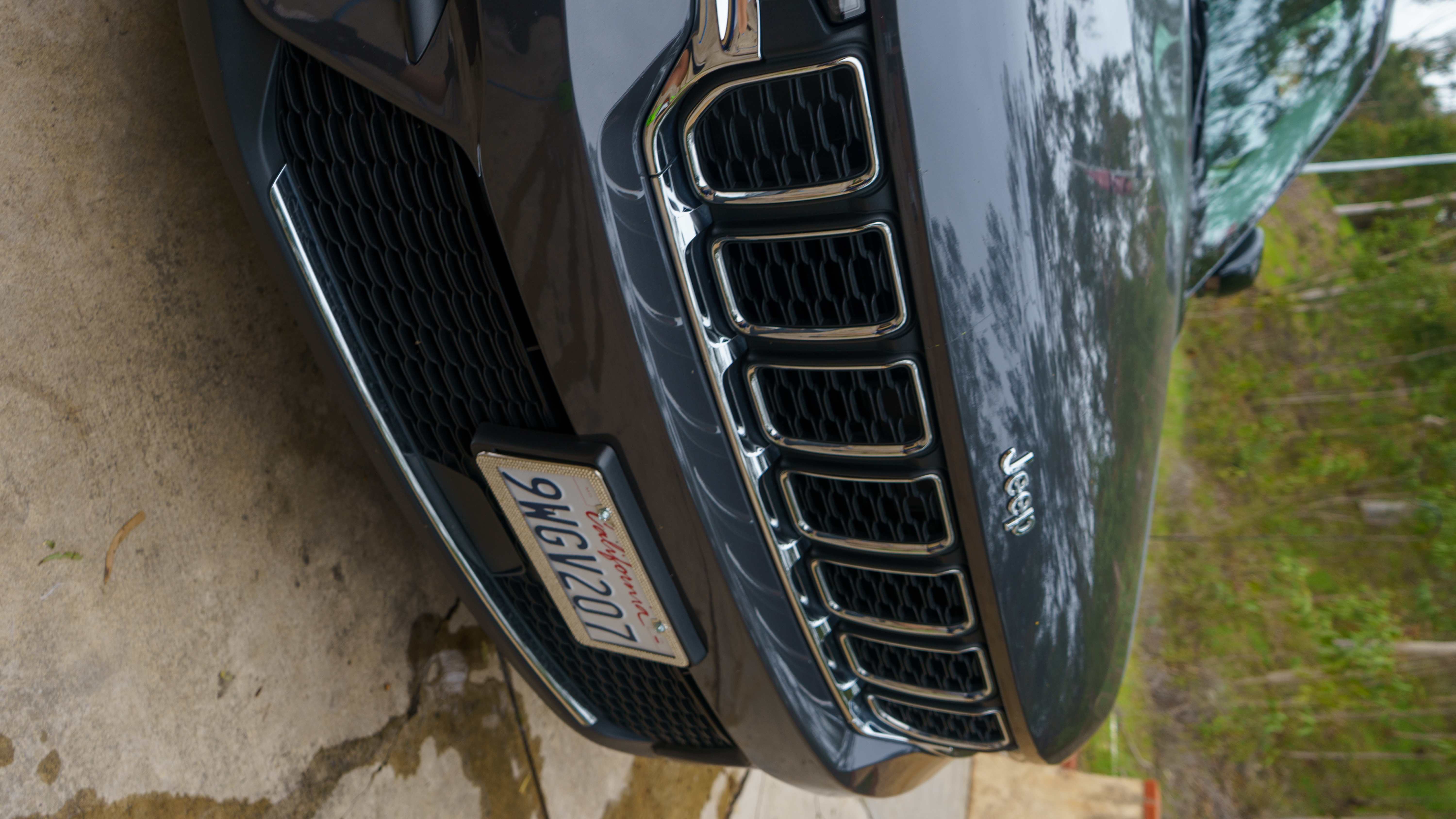 Jeep Grand Cherokee grille close-up showing polish detail